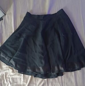 Limited womens 4 ruffled black skirt silk trim acetate lined. 